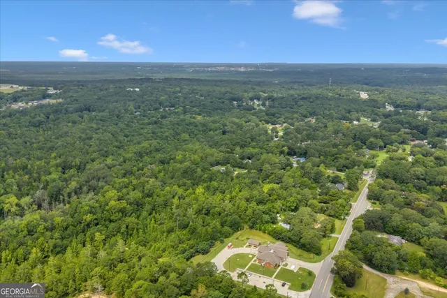 a view of an ocean and a yard