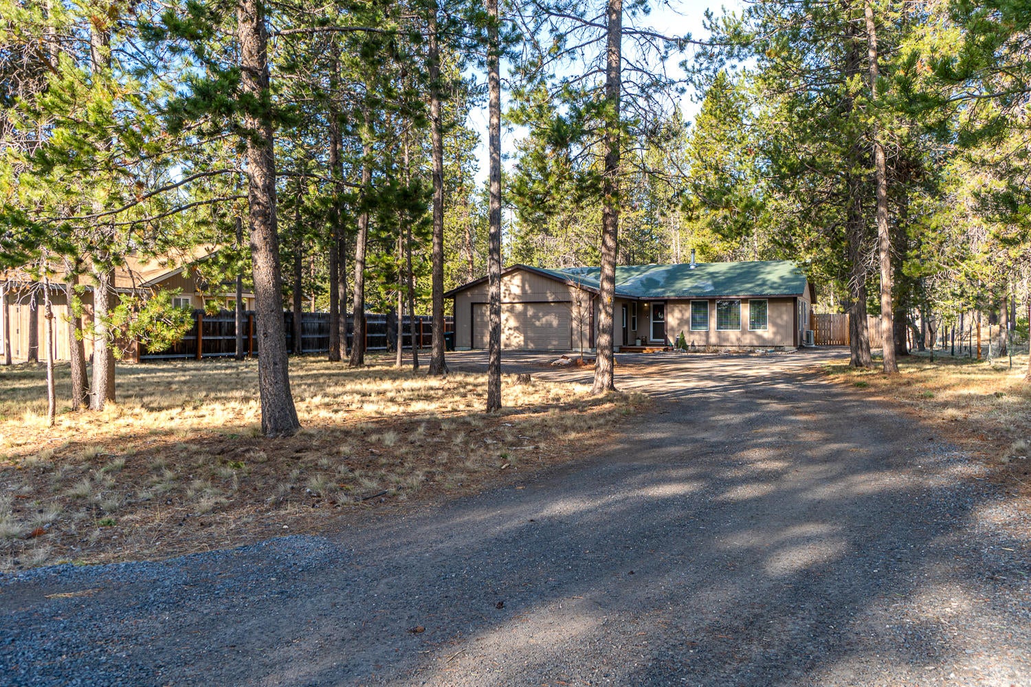 Nestled in the pines on nearly 1/2 acre.