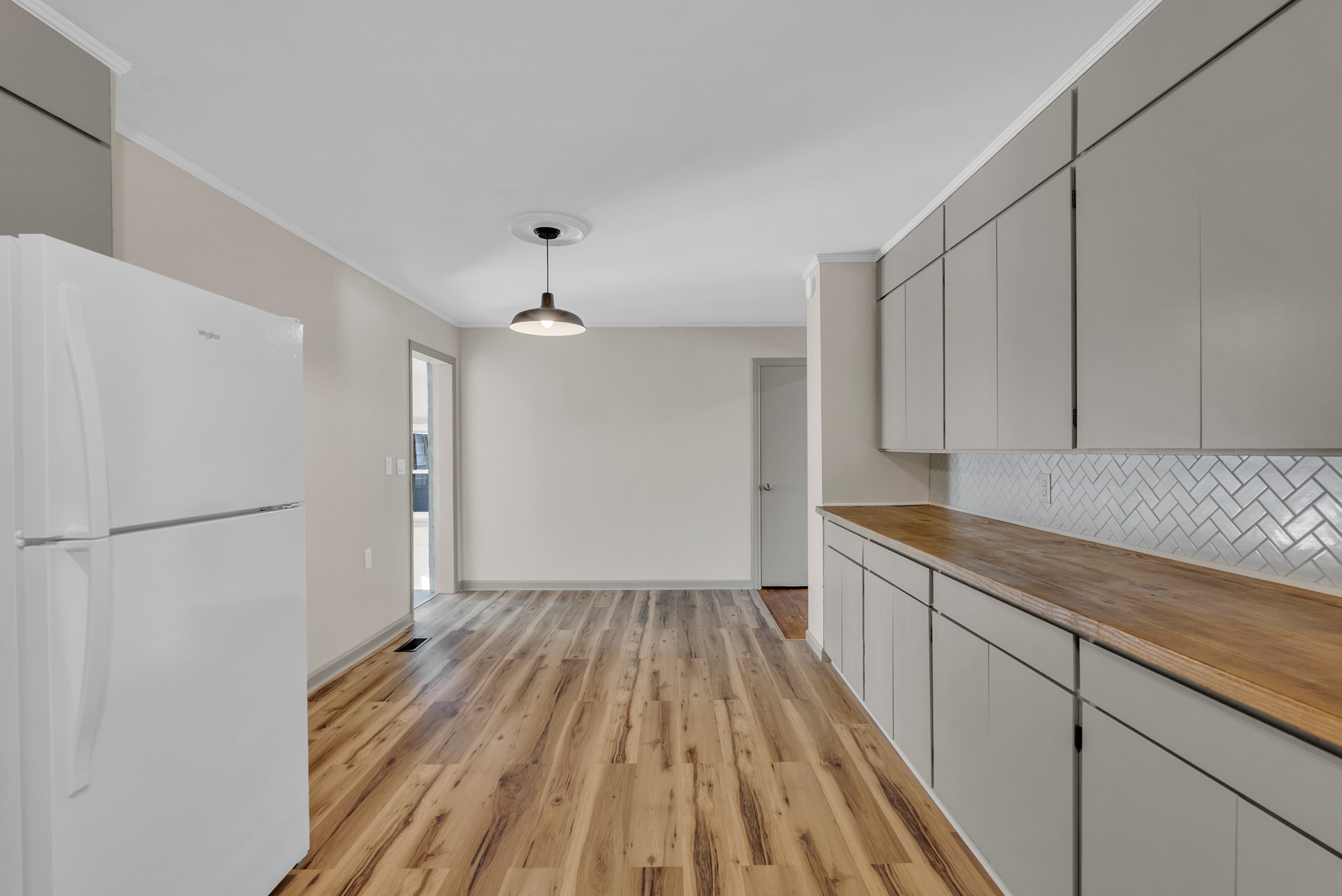 107 Oak Street Sparta, TN 38583 - Photo 7 of 26 a view of a kitchen with wooden floor