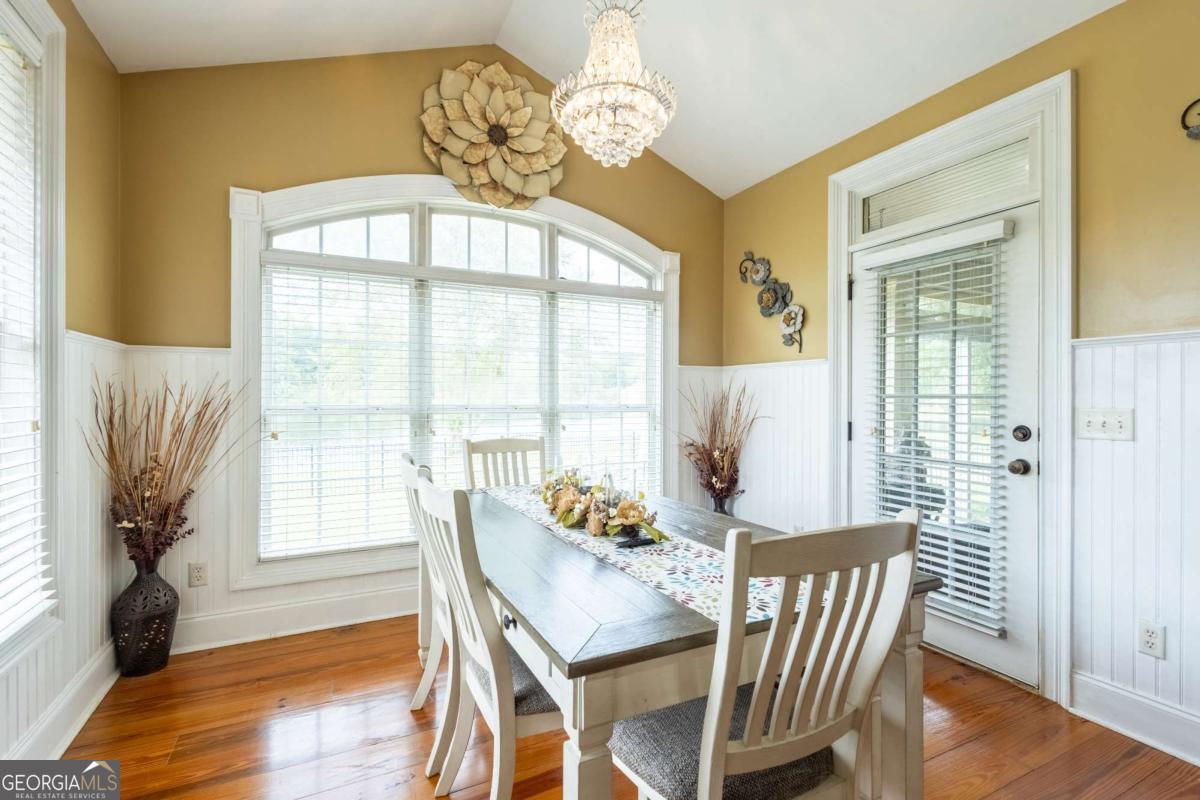20 Ray Taylor Road Tifton, GA 31793 - Photo 12 of 46 a view of a dining room with furniture window and wooden floor