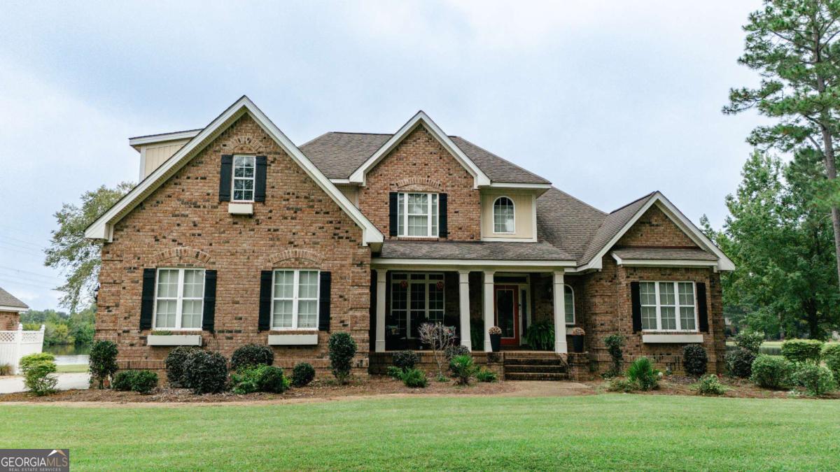 20 Ray Taylor Road Tifton, GA 31793 - Photo 2 of 46 front view of brick house with a yard