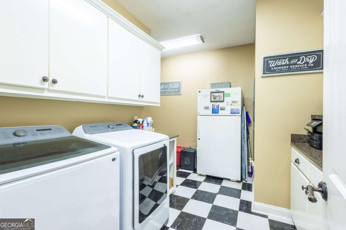 20 Ray Taylor Road Tifton, GA 31793 - Photo 35 of 46 a utility room with dryer and washer