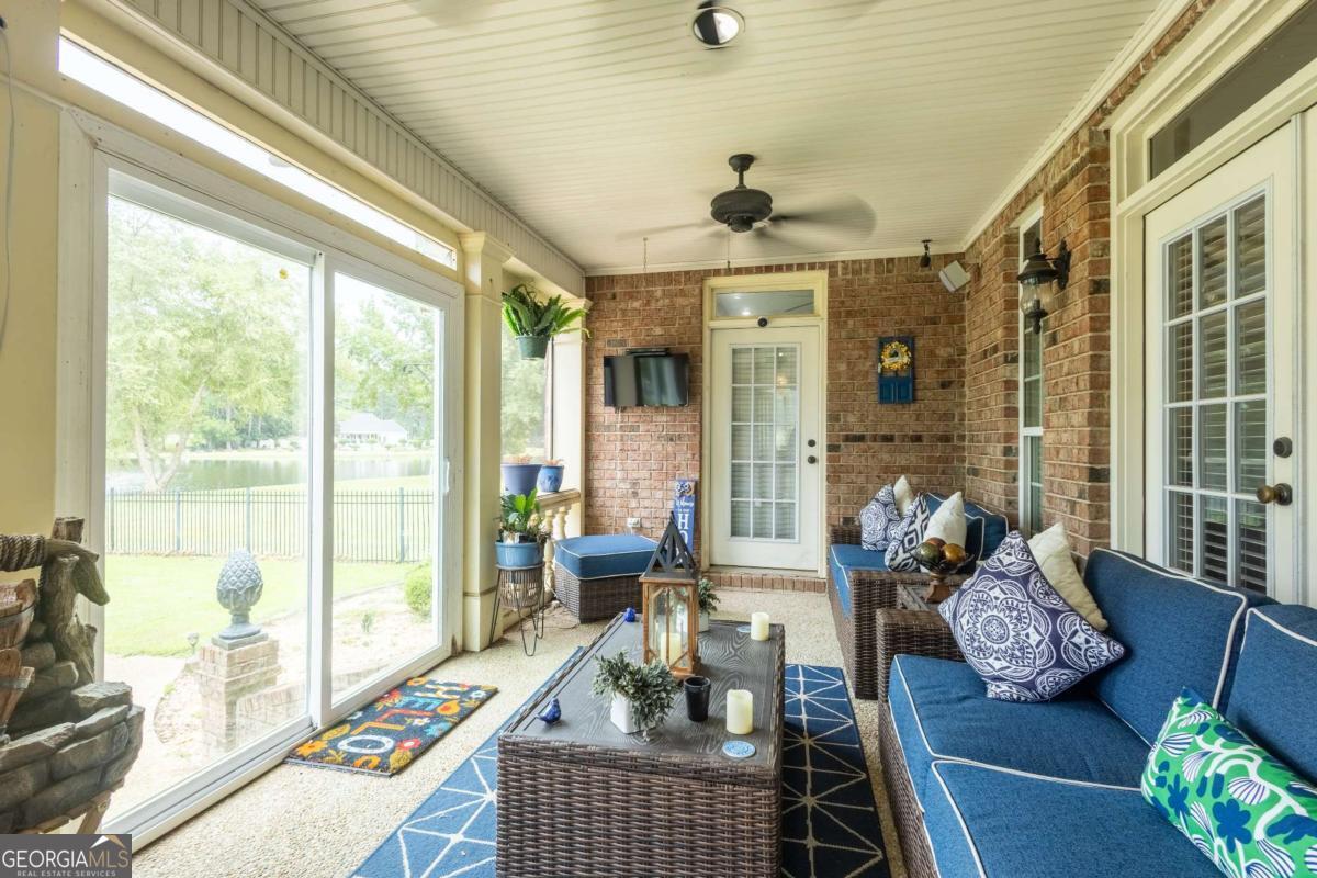 20 Ray Taylor Road Tifton, GA 31793 - Photo 37 of 46 a living room with furniture and a large window