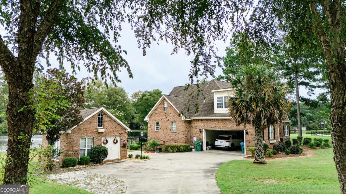 20 Ray Taylor Road Tifton, GA 31793 - Photo 44 of 46 a view of a house with a yard and large tree