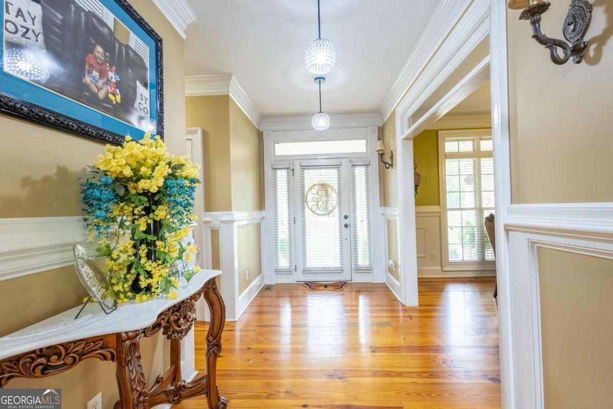 20 Ray Taylor Road Tifton, GA 31793 - Photo 5 of 46 a view of an entryway with wooden floor and door