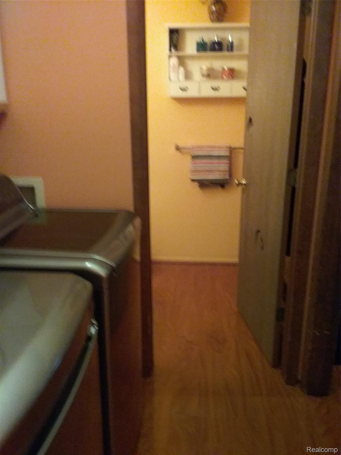 14902 Merriman Road Livonia, MI 48154 - Photo 7 of 21 Washer & Dryer and Lav off the Kitchen