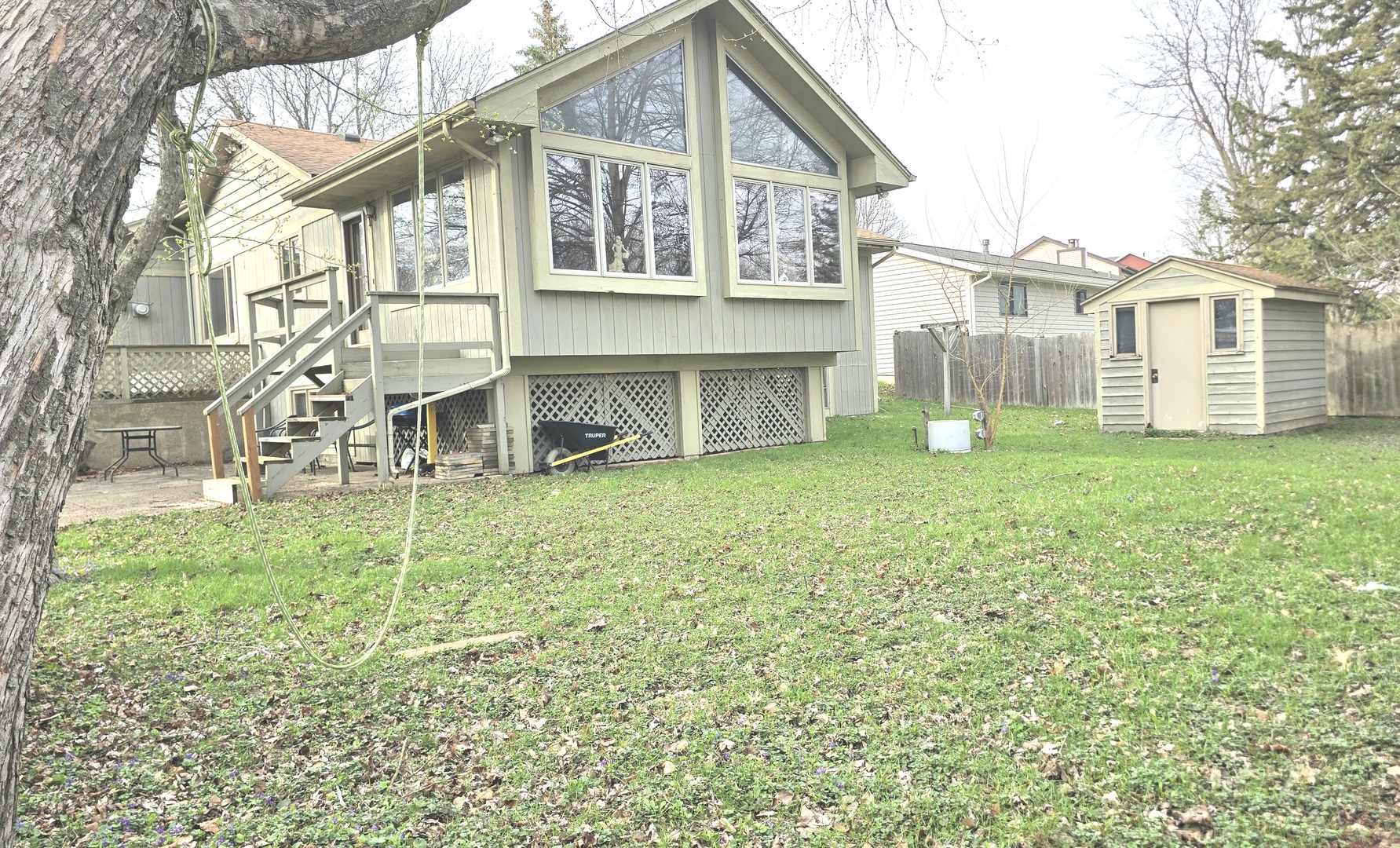 512 Shenandoah Trail Elgin, IL 60123 - Photo 19 of 20 a view of a house with a yard