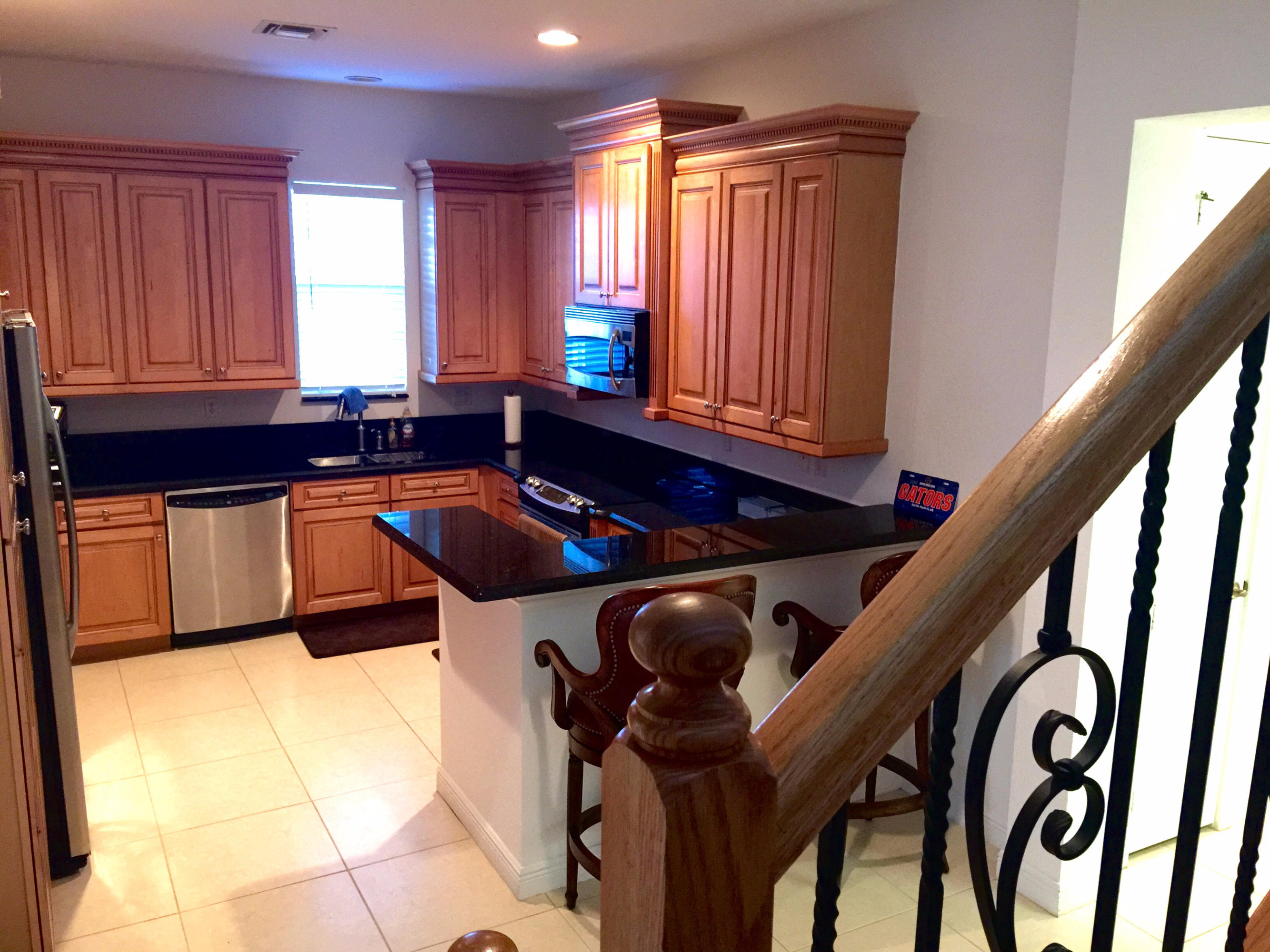 8343 Northwest 8th Terrace Boca Raton, FL 33487 - Photo 23 of 46 Kitchen View from Stairs