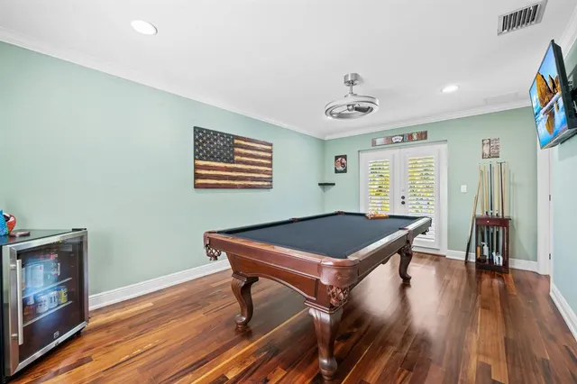 a room with furniture and wooden floor