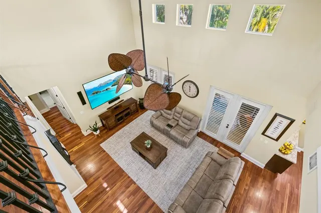 a view of living room with furniture and rug