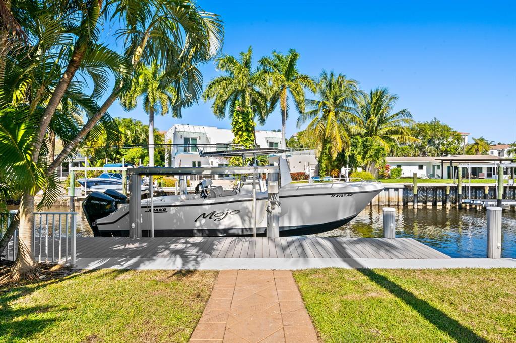 909 Turner Road Delray Beach, FL 33483 - Photo 34 of 50 a view of a swimming pool with a patio