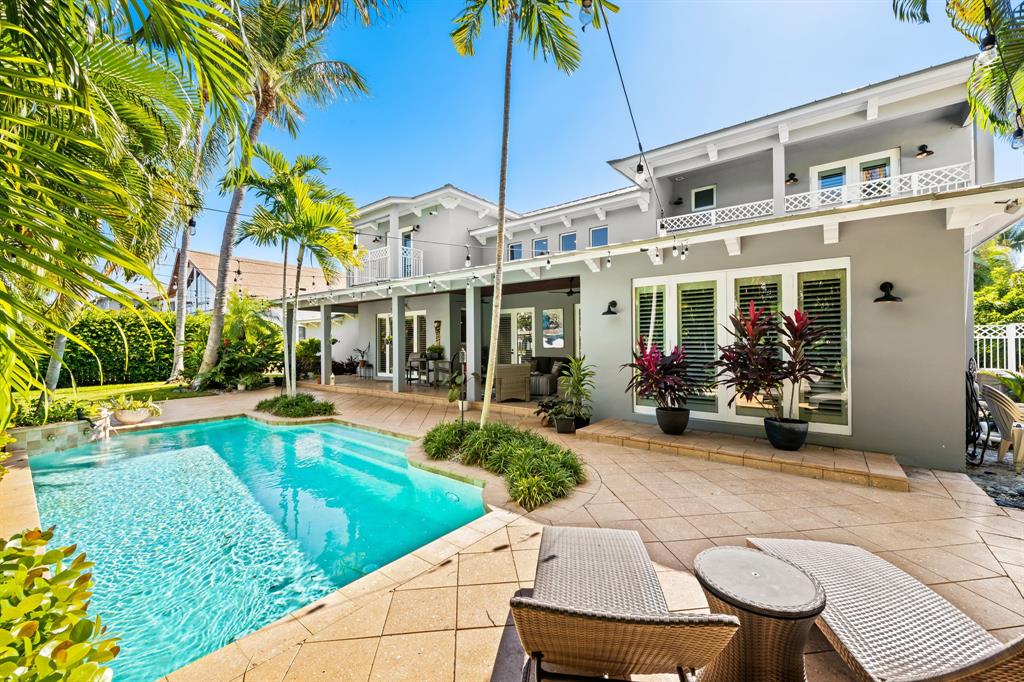 909 Turner Road Delray Beach, FL 33483 - Photo 36 of 50 a view of a house with backyard porch and sitting area