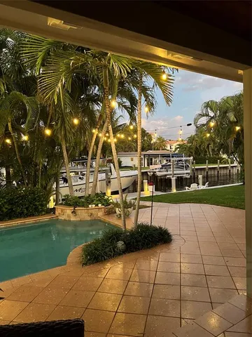 a view of a yard with an umbrella