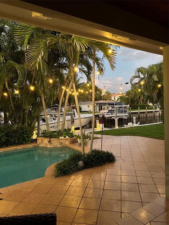 909 Turner Road Delray Beach, FL 33483 - Photo 49 of 50 a view of a yard with an umbrella