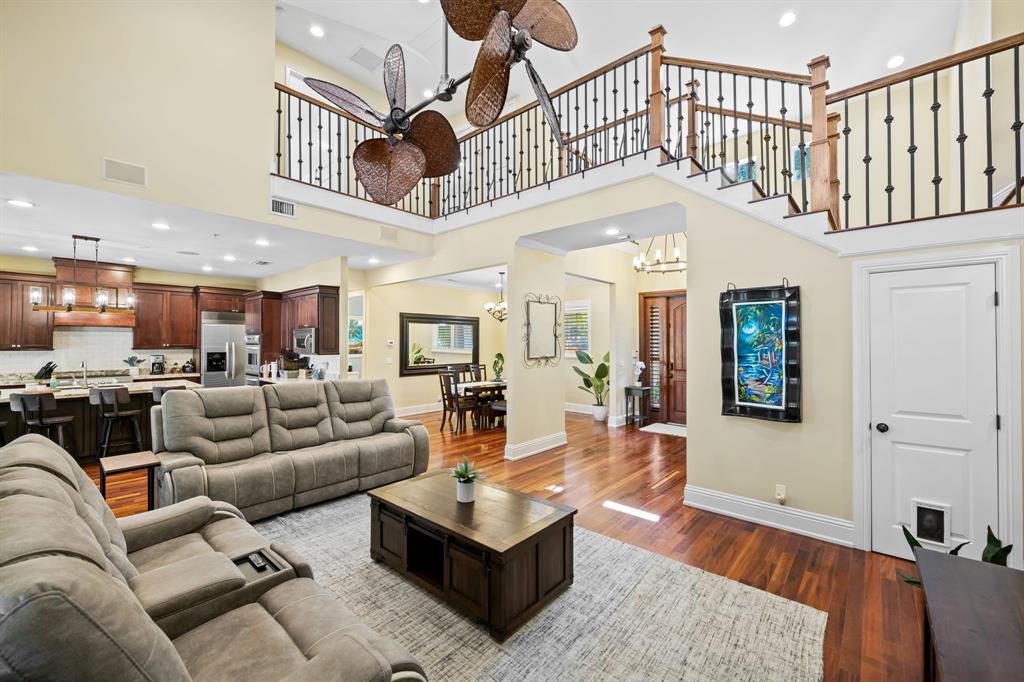 909 Turner Road Delray Beach, FL 33483 - Photo 7 of 50 a living room with furniture or kitchen view and a wooden floor