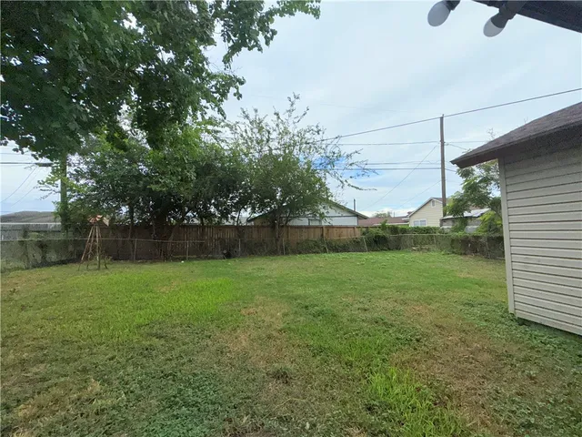 a view of a backyard with a garden
