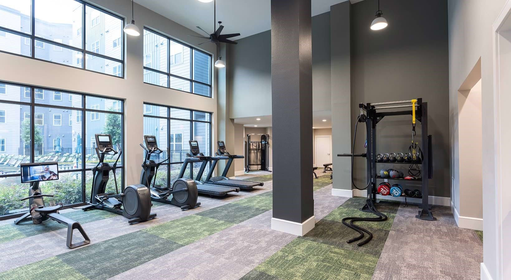 2425 Bell Street, Unit 1121 Houston, TX 77003 - Photo 27 of 30 a view of a room with gym equipment