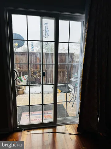 a room with gym equipment and a mirror