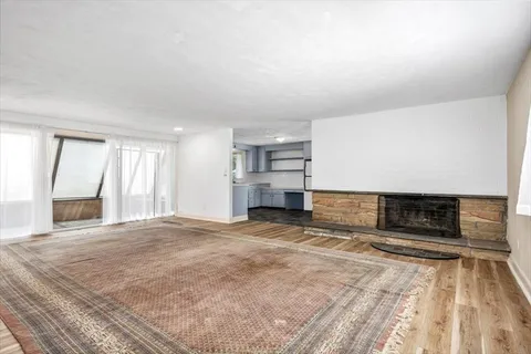 a living room with furniture and a table