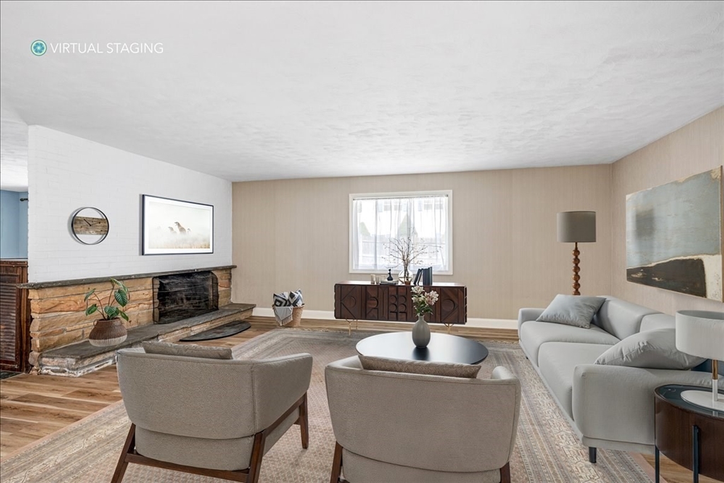 4 Richard Road Hingham, MA 02043 - Photo 12 of 37 a living room with furniture and a table