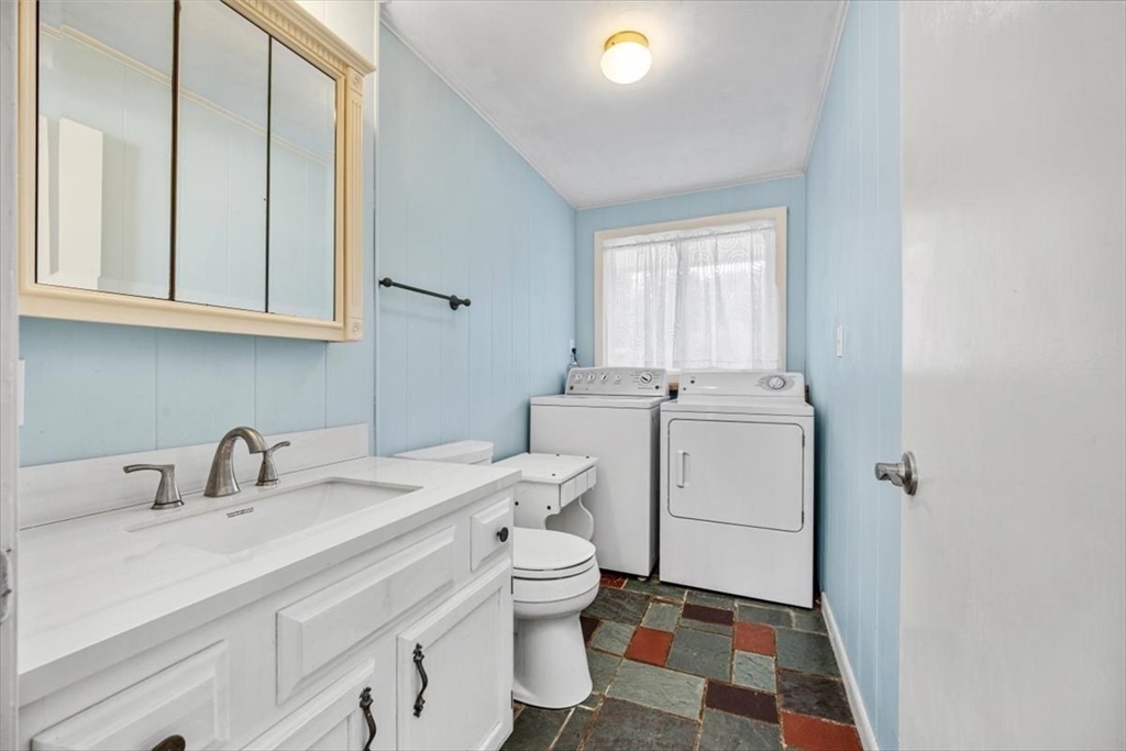 4 Richard Road Hingham, MA 02043 - Photo 15 of 37 a bathroom with a sink toilet and window