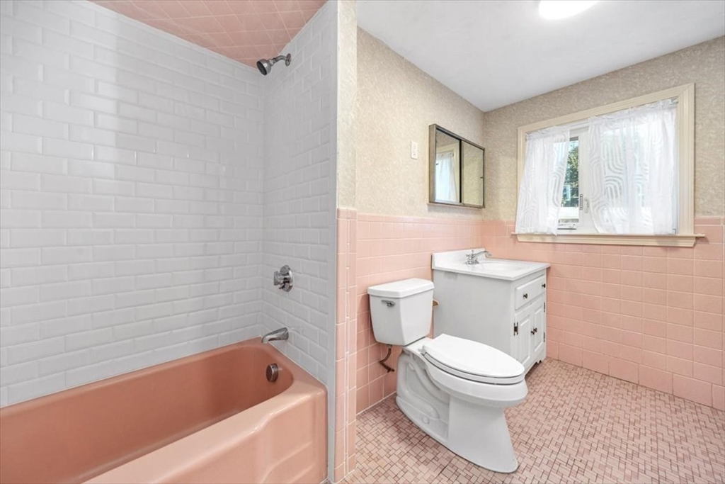 4 Richard Road Hingham, MA 02043 - Photo 21 of 37 a white toilet sitting next to a bath tub