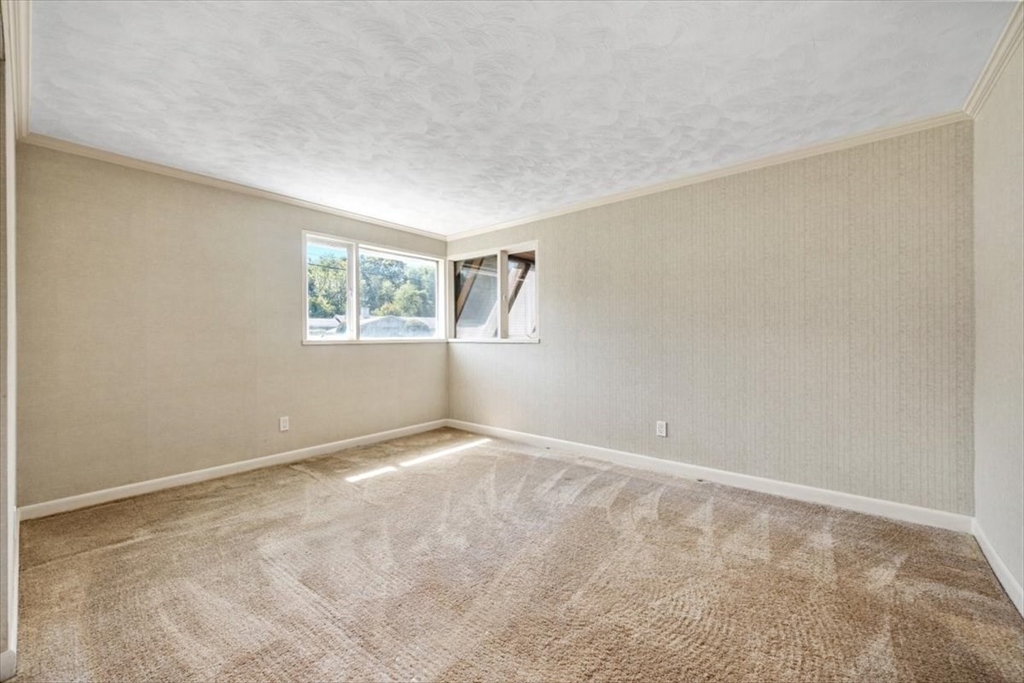 4 Richard Road Hingham, MA 02043 - Photo 24 of 37 a view of an empty room with a window