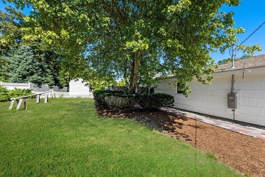 4 Richard Road Hingham, MA 02043 - Photo 27 of 37 a garden with trees in the background