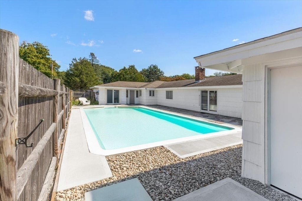 4 Richard Road Hingham, MA 02043 - Photo 29 of 37 a view of a house with pool and brick wall