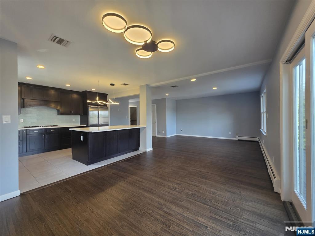 194 8th Street Cresskill, NJ 07626 - Photo 11 of 34 a view of kitchen and kitchen with wooden floor
