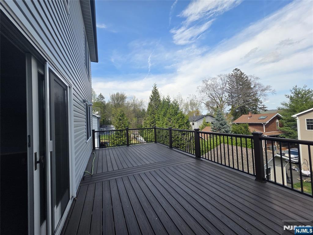 194 8th Street Cresskill, NJ 07626 - Photo 13 of 34 an outdoor view of balcony with wooden floor