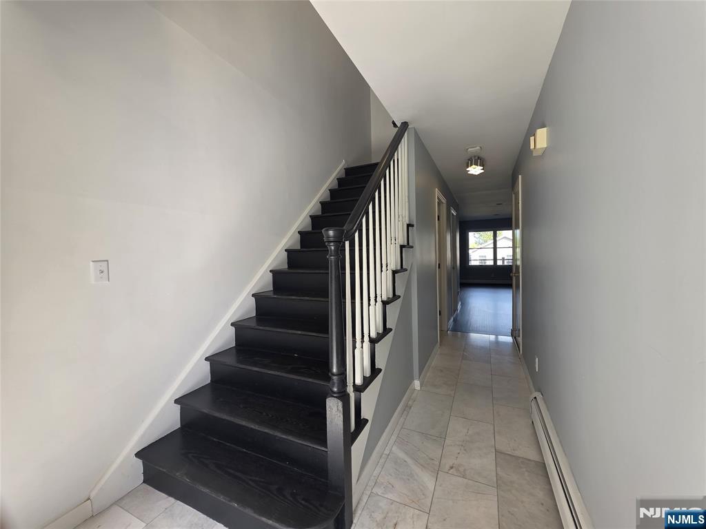 194 8th Street Cresskill, NJ 07626 - Photo 3 of 34 a view of entryway and hall with wooden floor