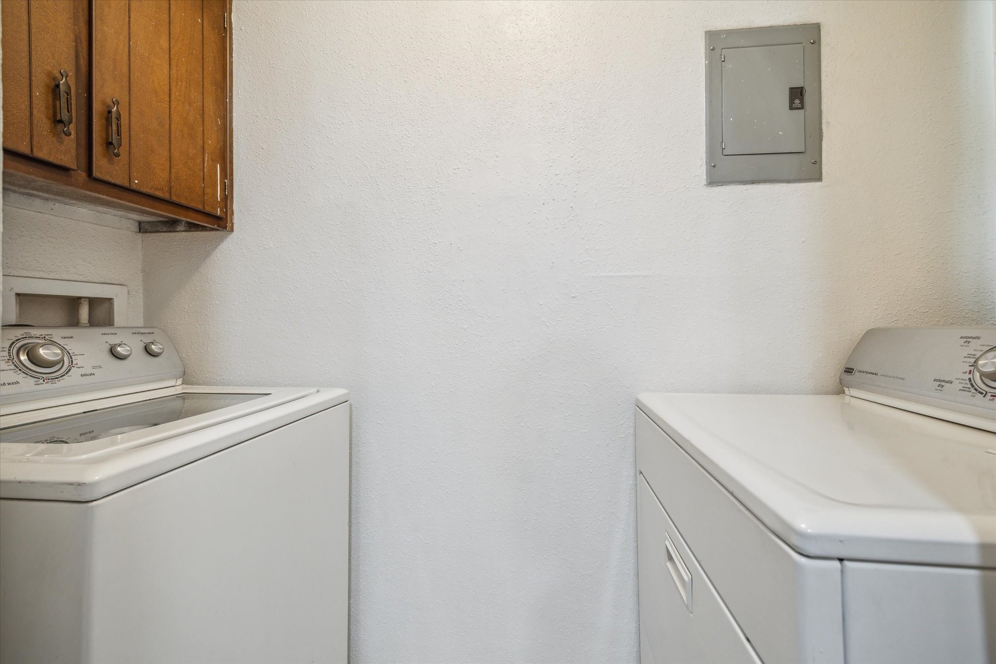 5667 Birchmont Drive, Unit A Houston, TX 77091 - Photo 16 of 18 a utility room with dryer and washer