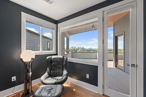 a view of a house with a lounge chair