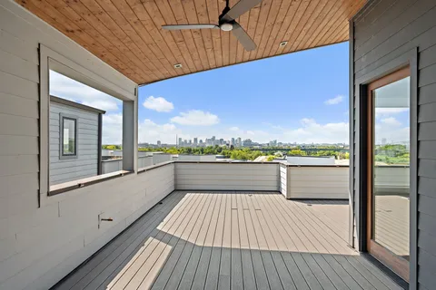 a view of a terrace with sitting area