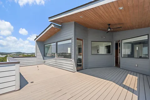 a view of a house with a sink and backyard