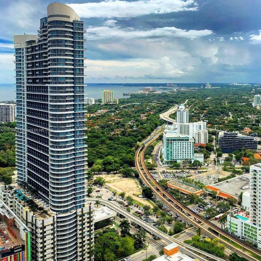 60 Southwest 13th Street, Unit 2413 Miami, FL 33130 - Photo 1 of 27 a view of a city with tall buildings
