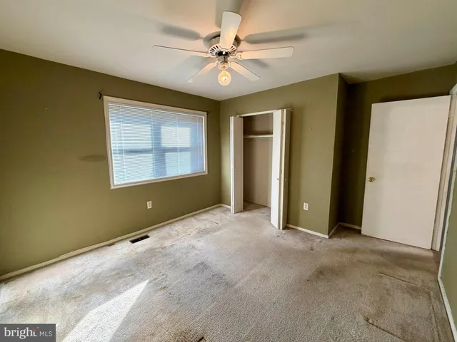 a view of a livingroom with a staircase