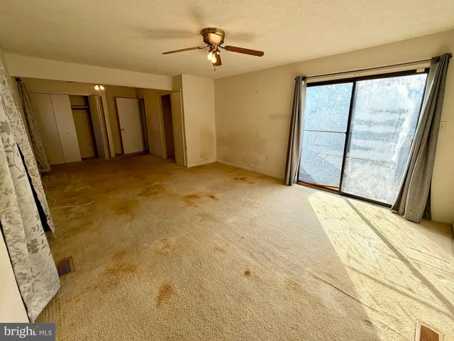 a view of a livingroom with an entryway