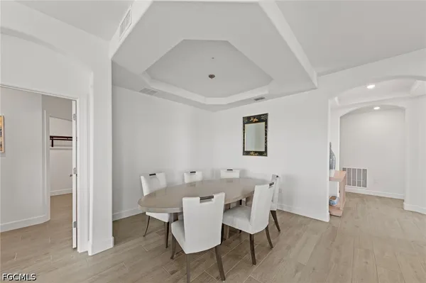 a view of a dining room with furniture window and outside view