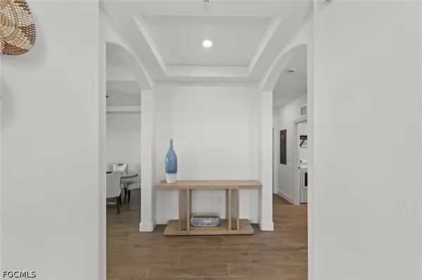 a living room with furniture and a table