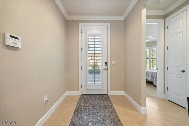 a view of a hallway with windows and yard