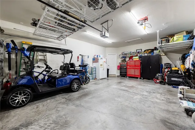 a view of a house with a big yard and potted plants
