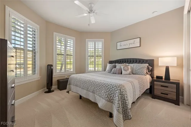 a bed room with a bed and a tv