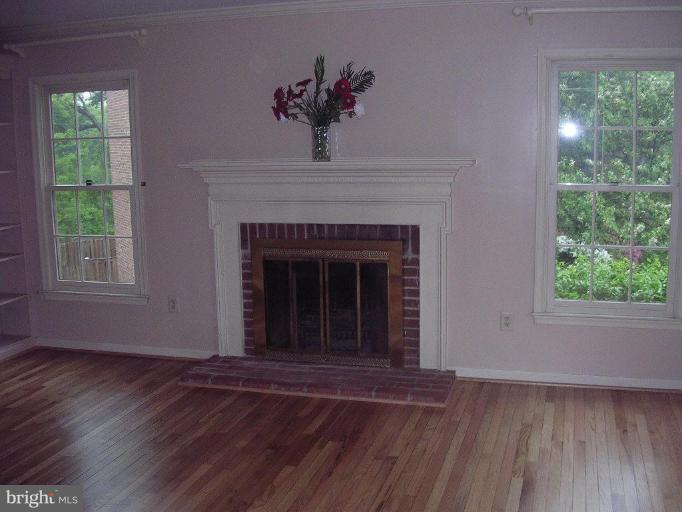 2280 Cartbridge Road Falls Church, VA 22043 - Photo 3 of 10 LR w/Fireplace and End Unit Windows