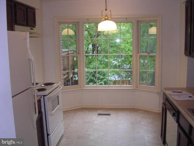 2280 Cartbridge Road Falls Church, VA 22043 - Photo 6 of 10 Kitchen w/Bay Window and ESIK-Table