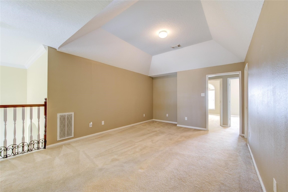14420 Walters Road, Unit 58 Houston, TX 77014 - Photo 21 of 25 a view of an empty room with wooden floor