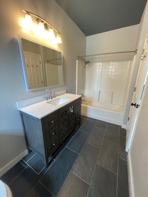 7501 Shadowridge Run, Unit 135 Austin, TX 78749 - Photo 14 of 23 a bathroom with a vanity mirror and a sink