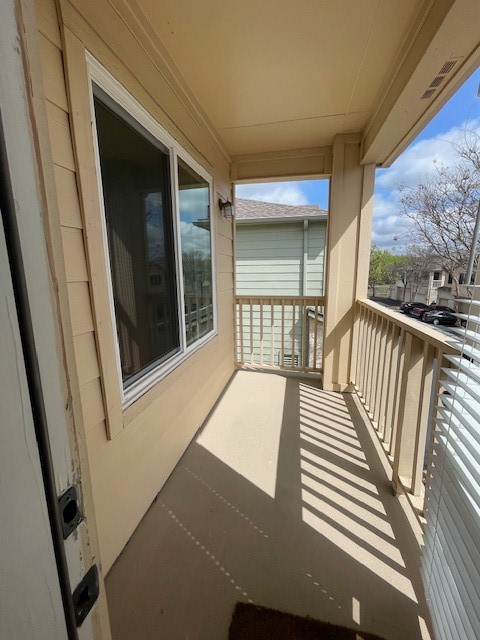 7501 Shadowridge Run, Unit 135 Austin, TX 78749 - Photo 22 of 23 a view of a balcony with furniture