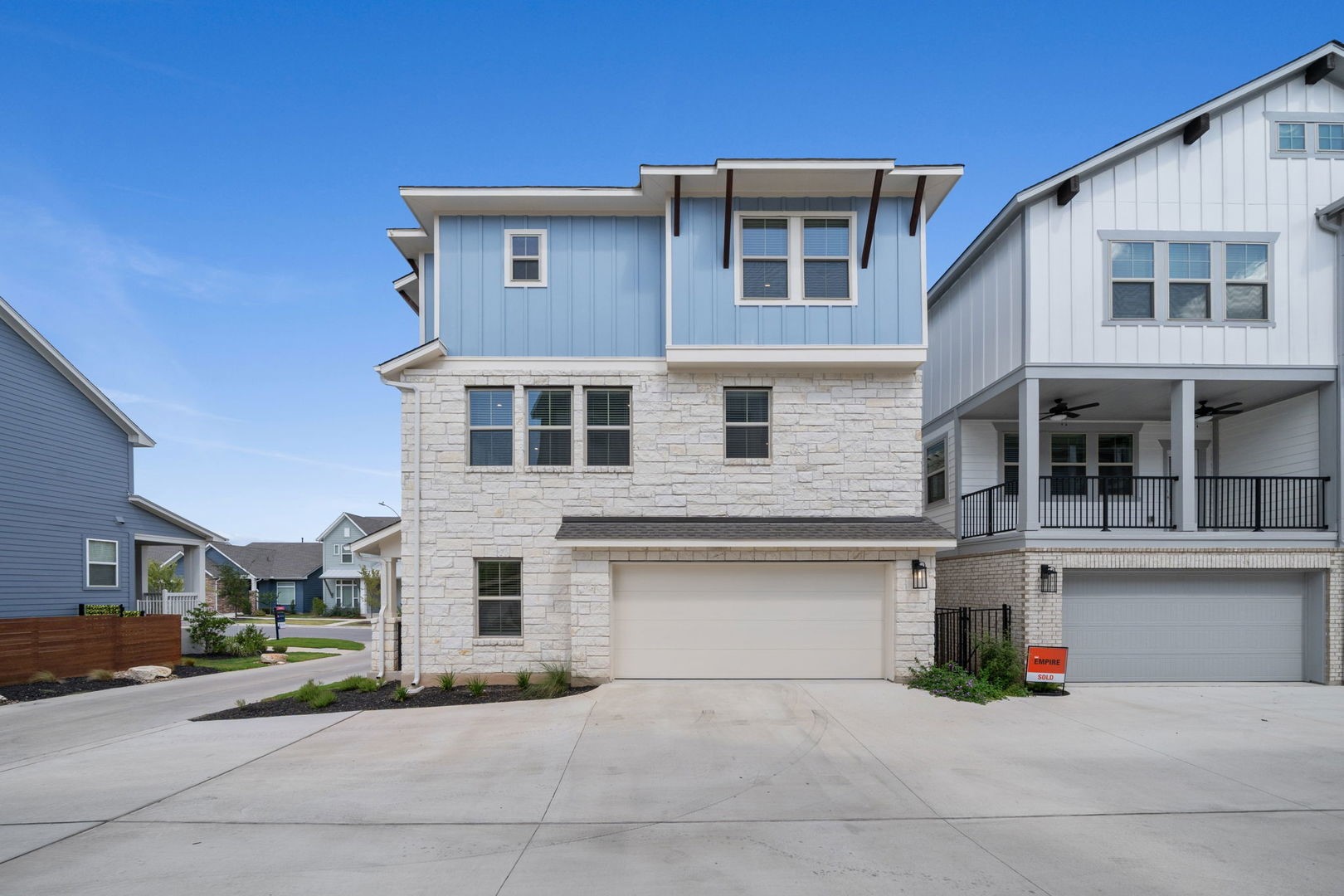 6312 Stockman Drive, Unit 5 Austin, TX 78747 - Photo 3 of 40 a front view of a house with garage
